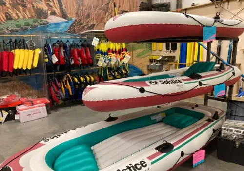 inflatable red, teal and white rafts