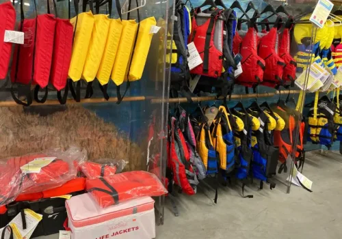 Rows of colorful life jackets